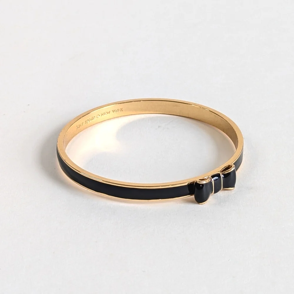kate spade Black and Gold Enamel Bow Bangle Bracelet